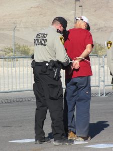 Scott Schaeffer-Duffy arrested at Creech drone base, photo by Felice Cohen-Joppa